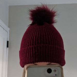 Cranberry winter hat faux fur pom pom